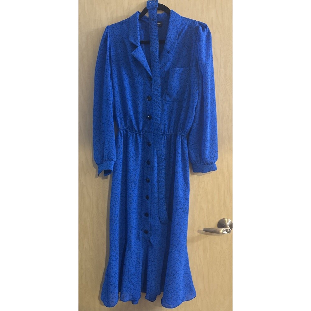 vintage 80s Office blue puff  long-sleeve dress with buttons and a ruffle hem.